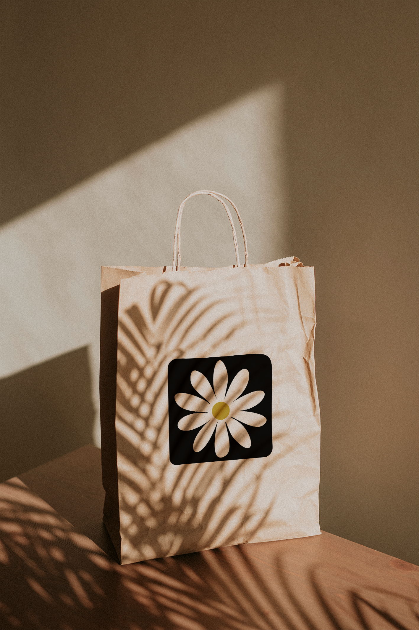 natural-paper-bag-with-palm-leaves-shadow